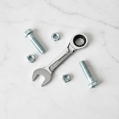 Clé plate cliquet compact sur plaque marbre