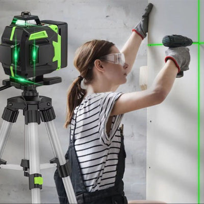 femme pose gypse avec niveau laser 360