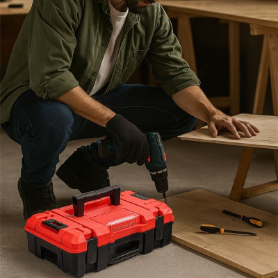 Homme construit établi avec caisse a outils
