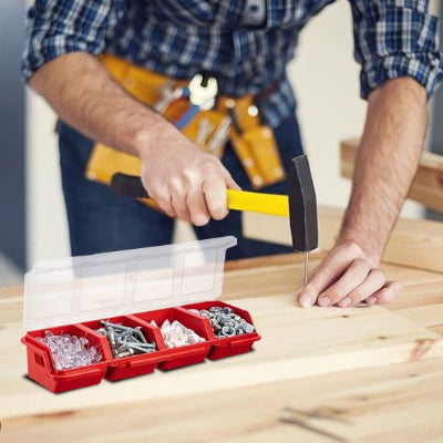 Homme utilise les vis de boite à outils