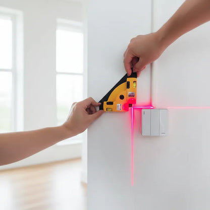 Homme utilise niveau laser niveler angle prise