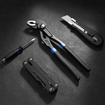 Pince multiprise plomberie sur plancher ardoise noire